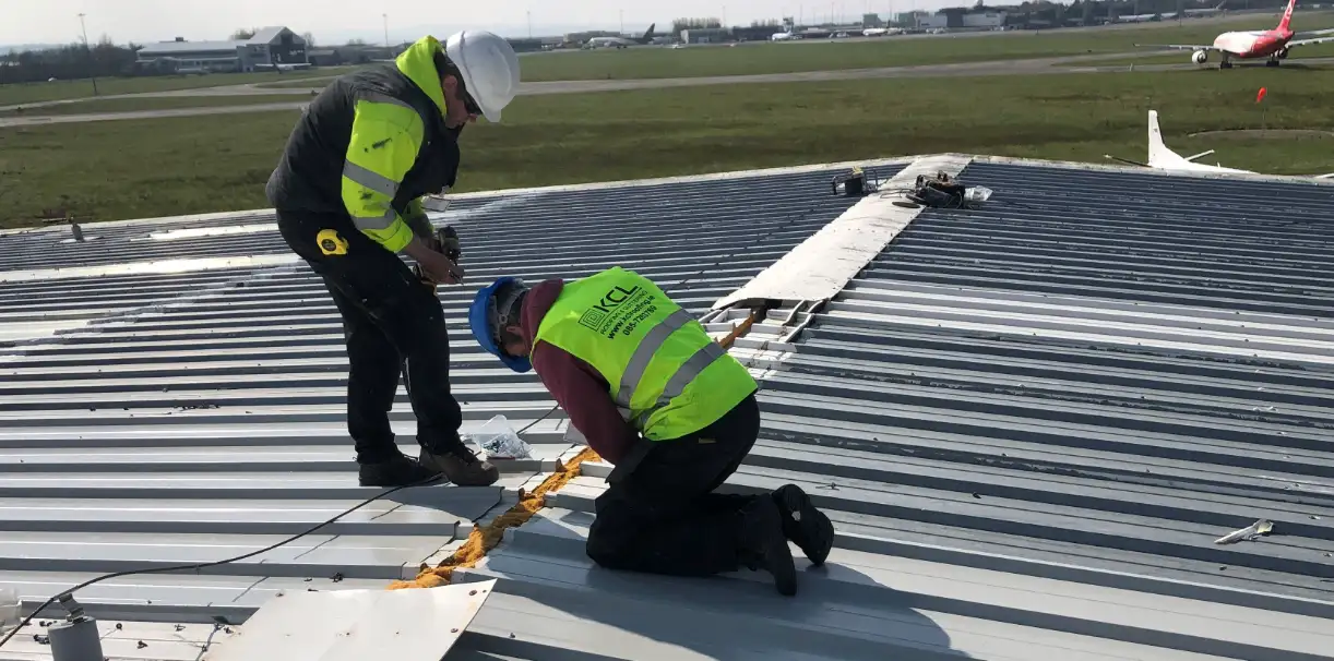 FCR Roofers working on an industrial roof at an airport
